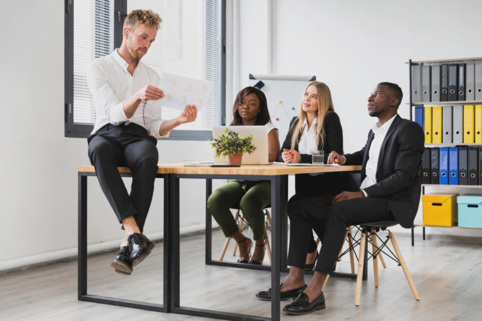 Australian business meeting with team members discussing strategic initiatives